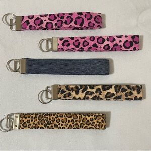 Leopard, denim, floral and polka dot wristlet key fobs.